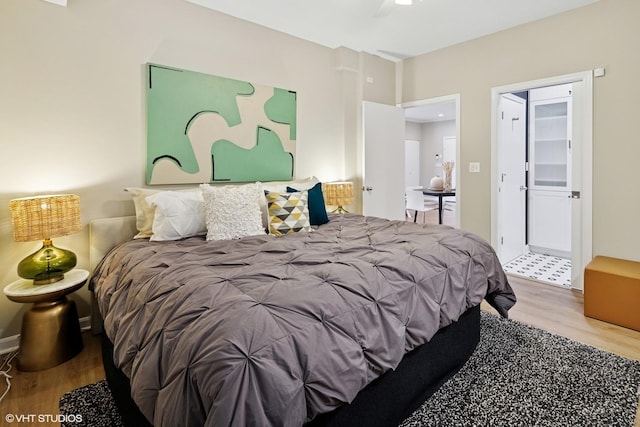 bedroom featuring wood finished floors