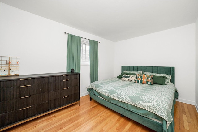 bedroom featuring light hardwood / wood-style floors