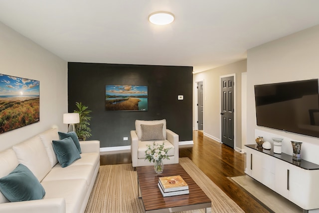 living room with dark hardwood / wood-style floors