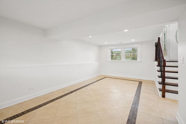 basement with light tile patterned flooring