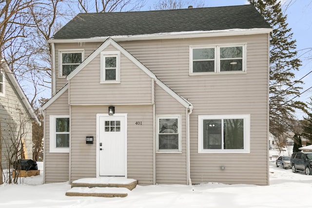 view of front of home featuring a shingled roof