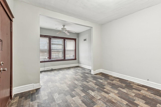 interior space featuring dark hardwood / wood-style flooring and ceiling fan