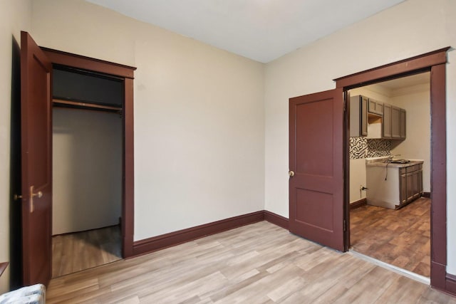 unfurnished bedroom with light hardwood / wood-style flooring