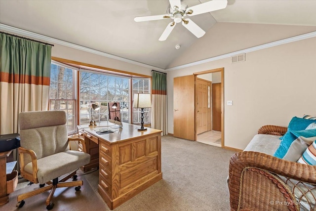 carpeted office with vaulted ceiling, ornamental molding, and ceiling fan