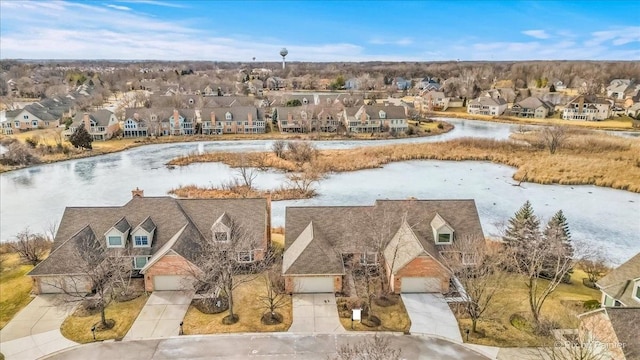 drone / aerial view featuring a water view