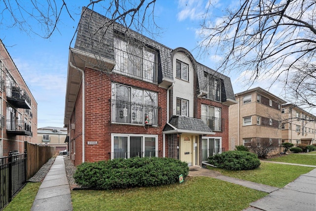 view of front of property with a front lawn