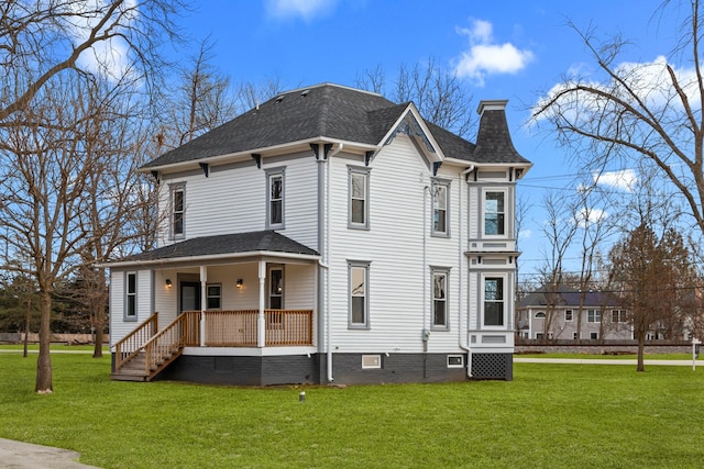 view of front facade with a porch and a front yard