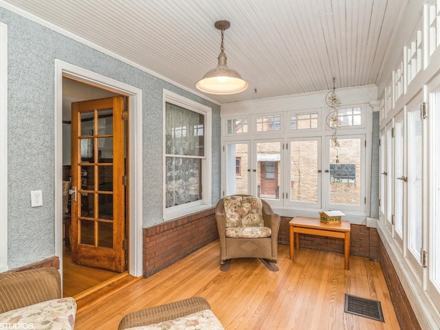 sunroom / solarium with wood ceiling