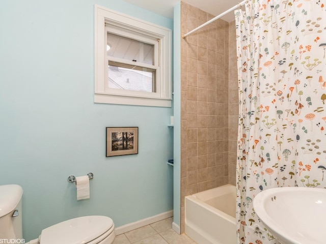 bathroom with shower / bath combo, tile patterned floors, and toilet