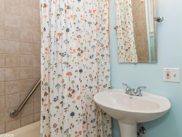 bathroom featuring sink and walk in shower