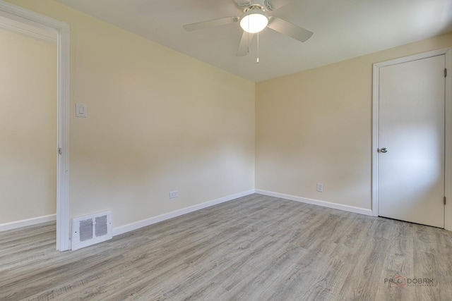 7345 S Washtenaw Ave, Chicago, IL 60629 - empty room with light wood-type flooring and ceiling fan