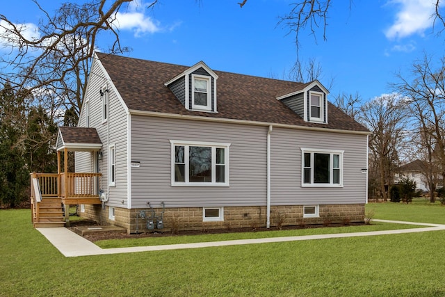 view of home's exterior with a lawn