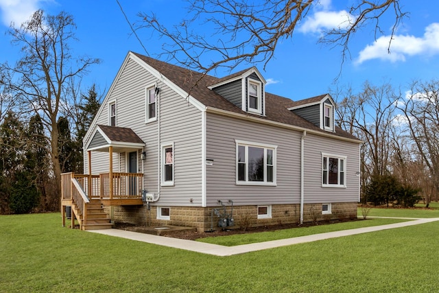 view of home's exterior featuring a lawn