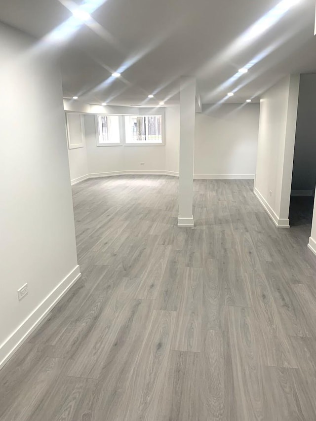 basement featuring hardwood / wood-style flooring