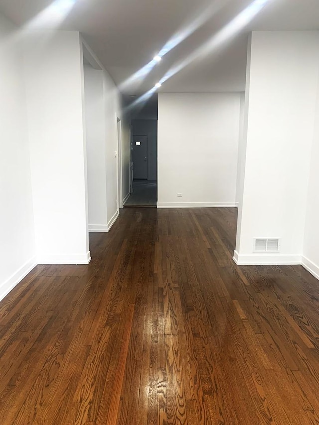 interior space with dark wood-type flooring