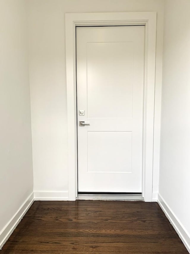 doorway featuring dark hardwood / wood-style floors