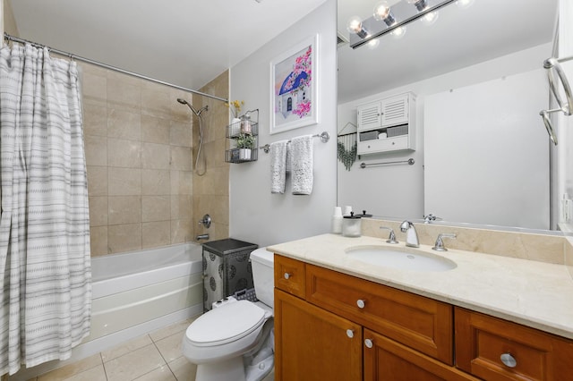 full bathroom with tile patterned flooring, vanity, toilet, and shower / bath combo