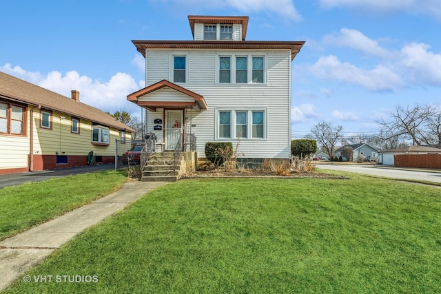 view of front of home with a front yard