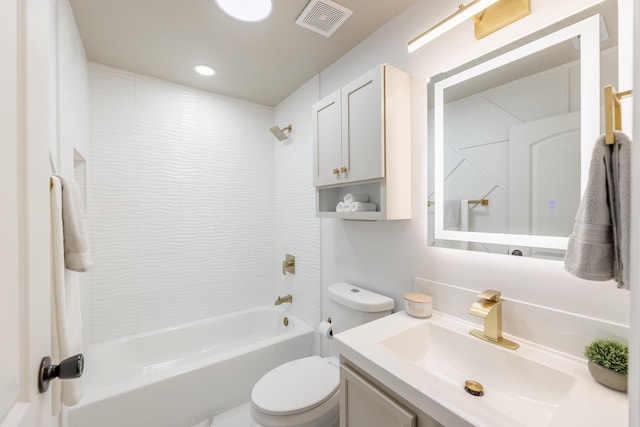 full bathroom with vanity, tub / shower combination, and toilet