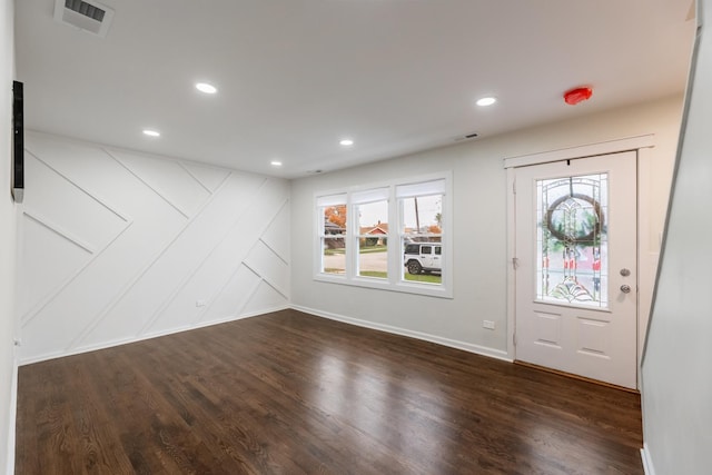 foyer entrance with dark hardwood / wood-style floors