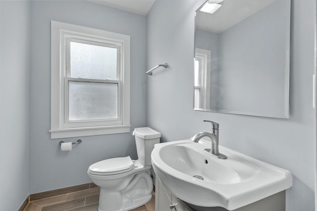 bathroom featuring sink and toilet