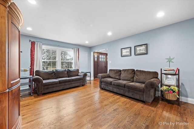 living room with light hardwood / wood-style floors