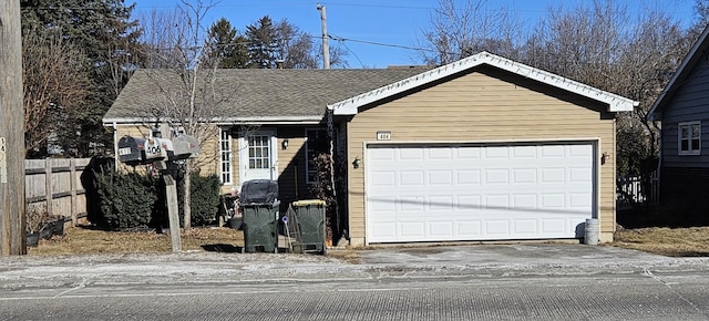 single story home with a garage