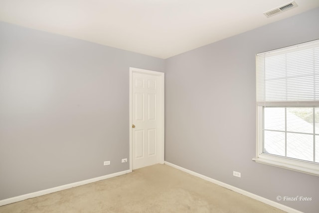 view of carpeted spare room