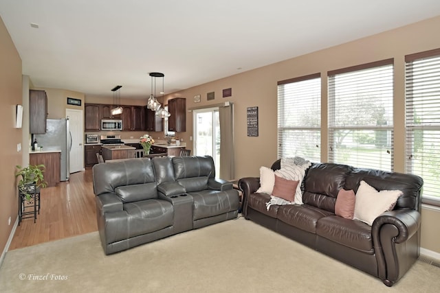 living room with light wood-type flooring