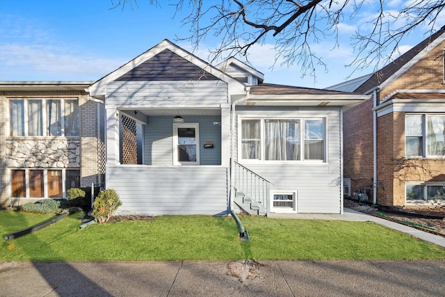 view of front of home with a front yard