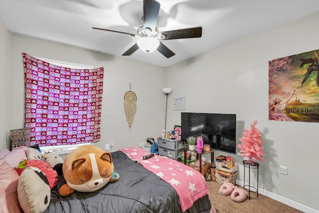 bedroom with ceiling fan and carpet flooring