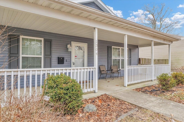 doorway to property featuring covered porch