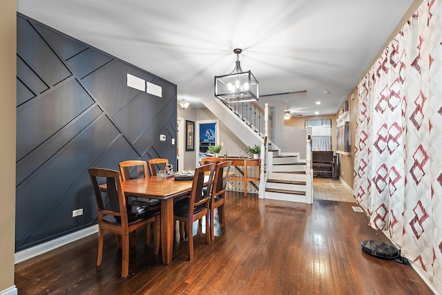 dining room featuring a chandelier and hardwood / wood-style floors