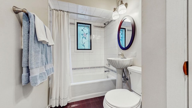 full bathroom featuring shower / bath combination with curtain, toilet, sink, and hardwood / wood-style flooring