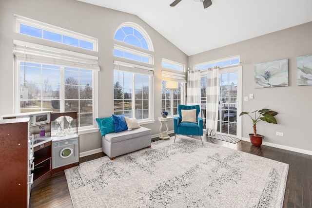 sunroom / solarium with lofted ceiling and a ceiling fan