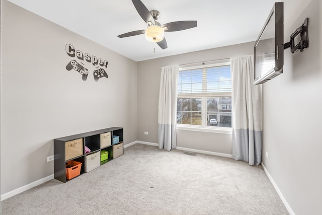 interior space featuring carpet floors, visible vents, and baseboards