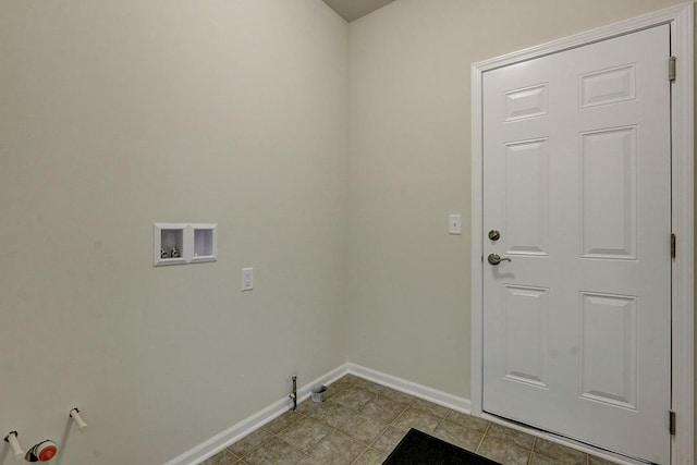 laundry area featuring gas dryer hookup, washer hookup, and light tile patterned floors