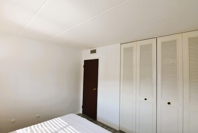 unfurnished bedroom featuring a closet