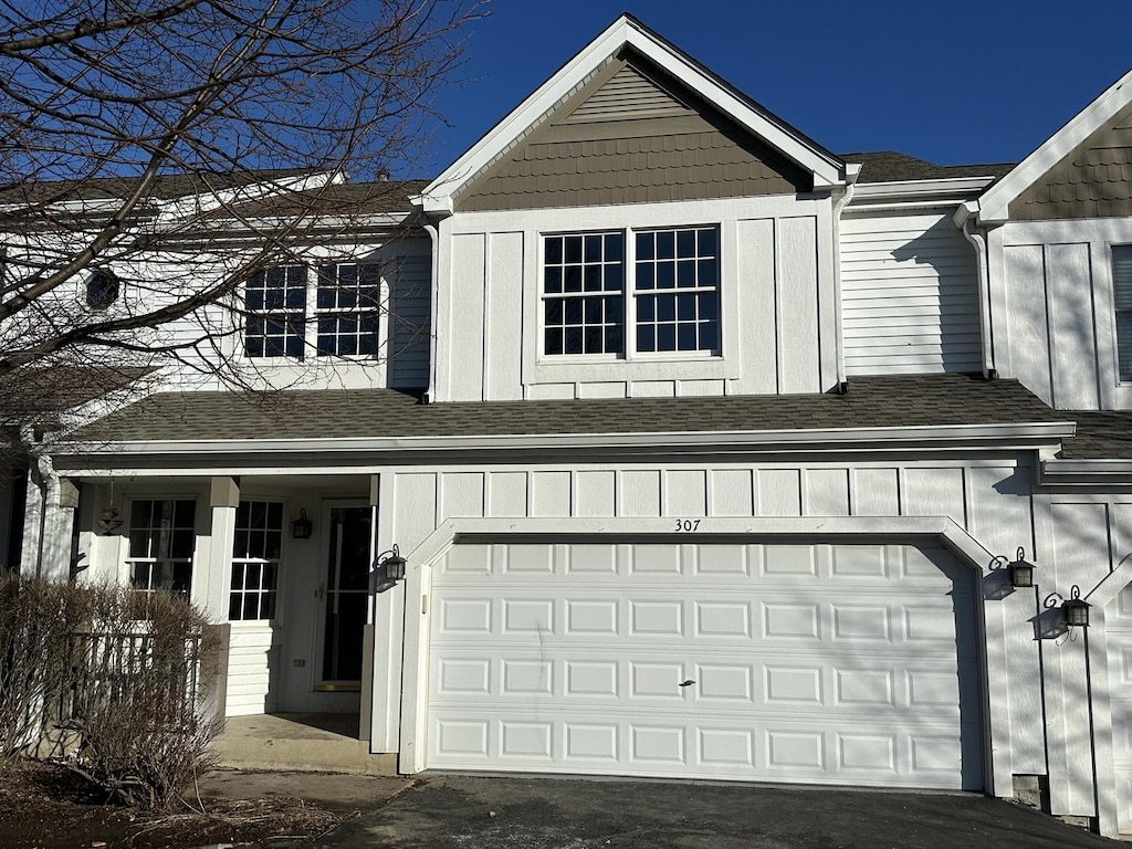 view of front of home with a garage