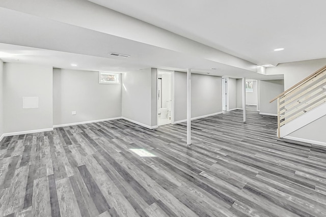 basement featuring hardwood / wood-style flooring