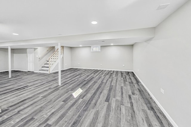 basement featuring hardwood / wood-style flooring