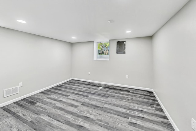 empty room with hardwood / wood-style floors