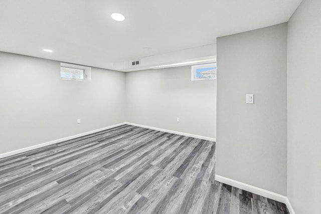 basement featuring hardwood / wood-style flooring