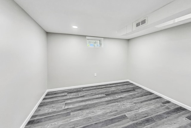 basement featuring hardwood / wood-style flooring