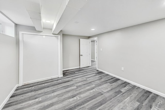 basement with wood-type flooring