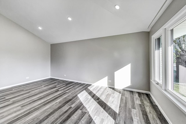 spare room featuring dark hardwood / wood-style flooring