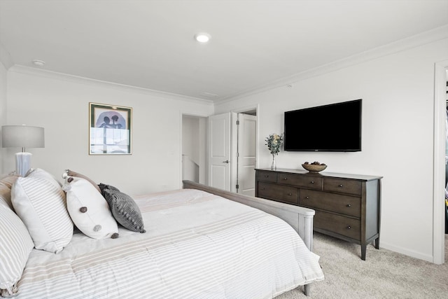 bedroom featuring crown molding and light colored carpet