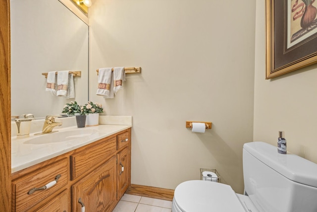 bathroom featuring vanity, toilet, and tile patterned flooring