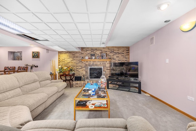 living room featuring a fireplace and light colored carpet