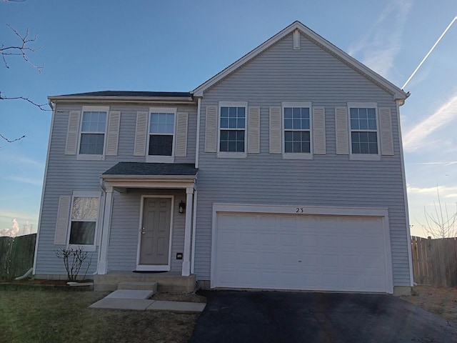 view of front property with a garage